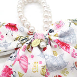 Claris: The Chicest Mouse In Paris™ Fashion Print and Pearl Hair Elastic with Bow