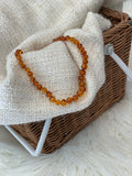 Amber Teething Necklace colour COGNAC