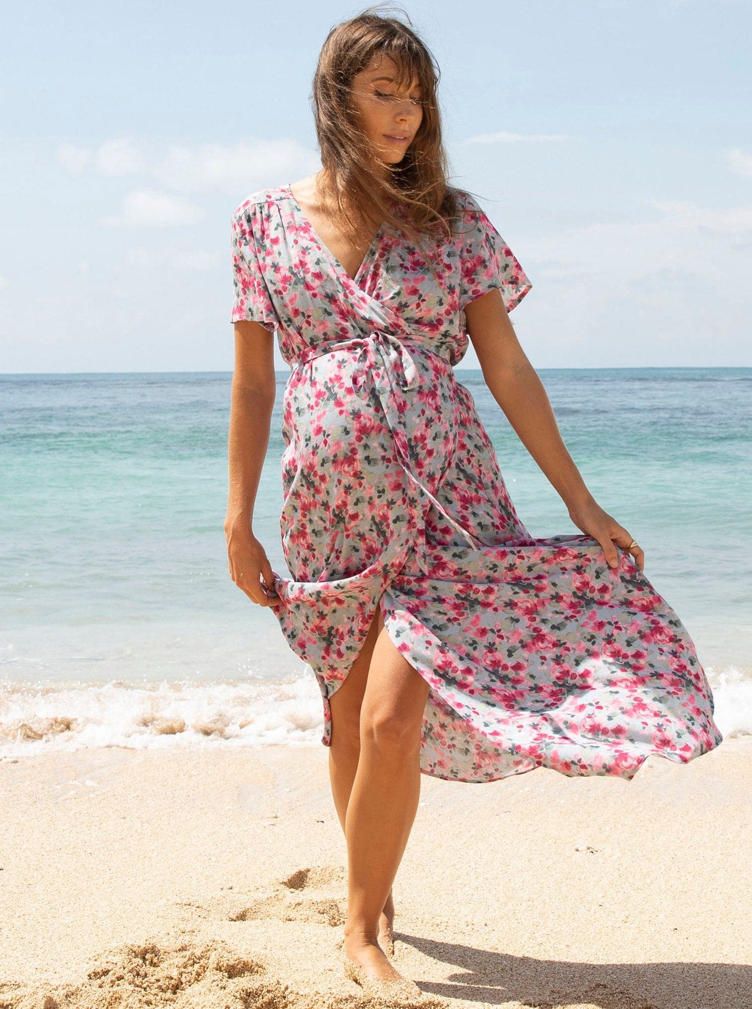 A woman in floral pink maternity & nursing wrap dress, main (6672544006238) (6688327729255)