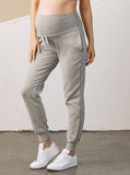 Close view - A pregnant woman in 2-Piece Calla zip front grey Maternity Tracksuit Pants (6726621003870)