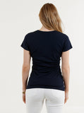 A woman in maternity nursing crossover bamboo tee, back