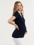A woman in maternity nursing crossover bamboo tee, side