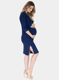 A women in navy knit ribbed maternity button front nursing dress standing, side
